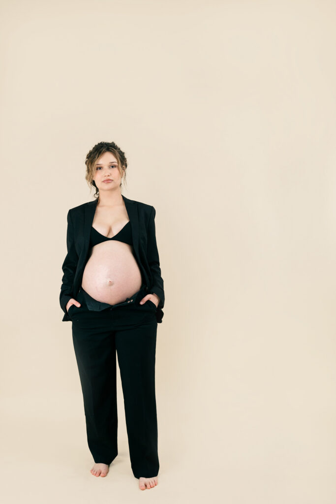 Elegant maternity portrait of a pregnant woman in a San Diego photo studio