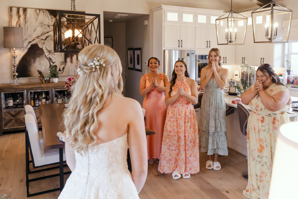 Emotional moment of the Bride having her first look with her bridesmaids