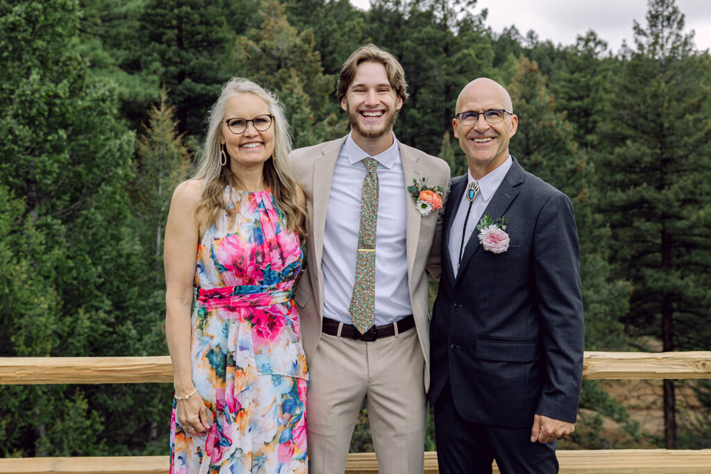Portrait of the groom and his parents