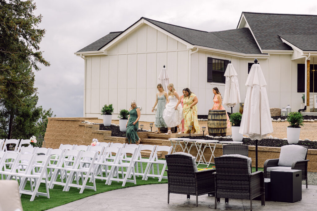 Bride and Bridesmaids walking toward the groom for the first touch