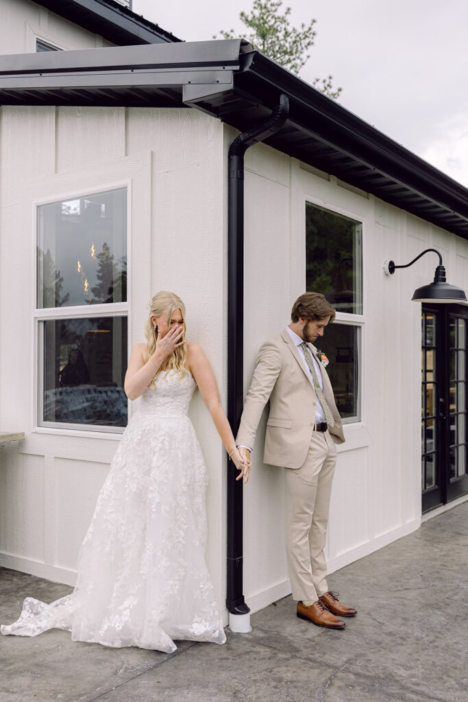 Bride crying at the first touch with the groom