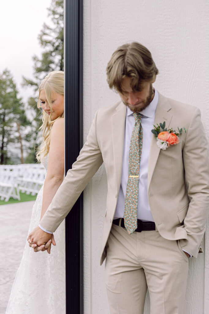 Bride and groom saying a prayer during the first touch