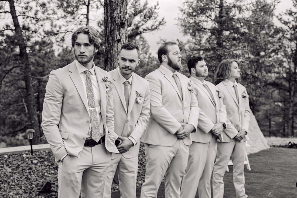 Groom and groomsmen waiting