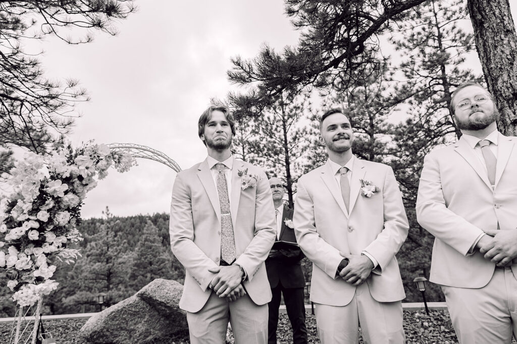 Groom getting emotional looking at the bride