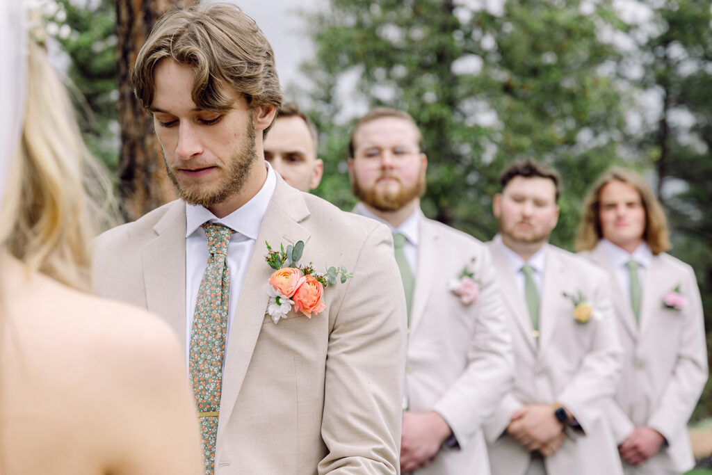 portrait of the groom during ceremony