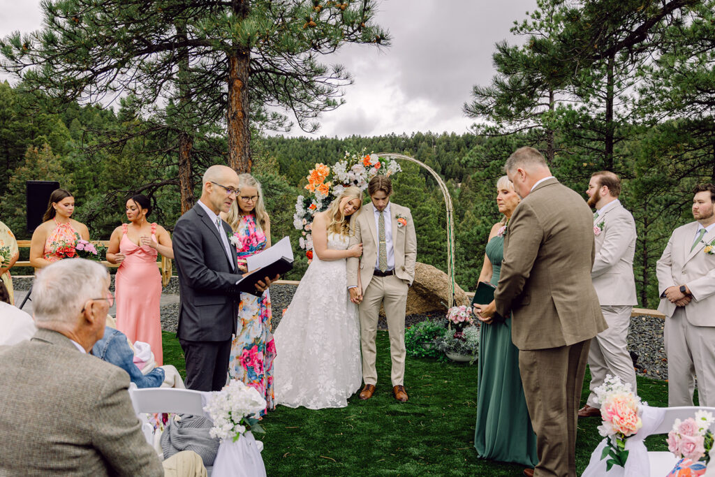 Parents reading prayers to the couple during the ceremony