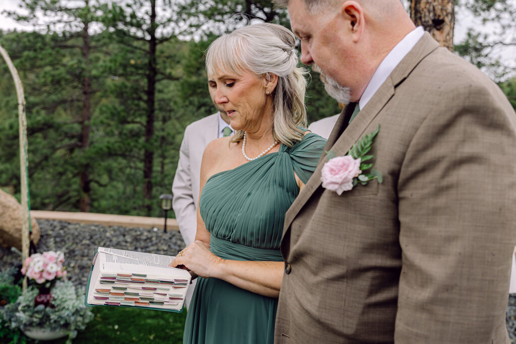 Mother of the bride reading at the ceremony