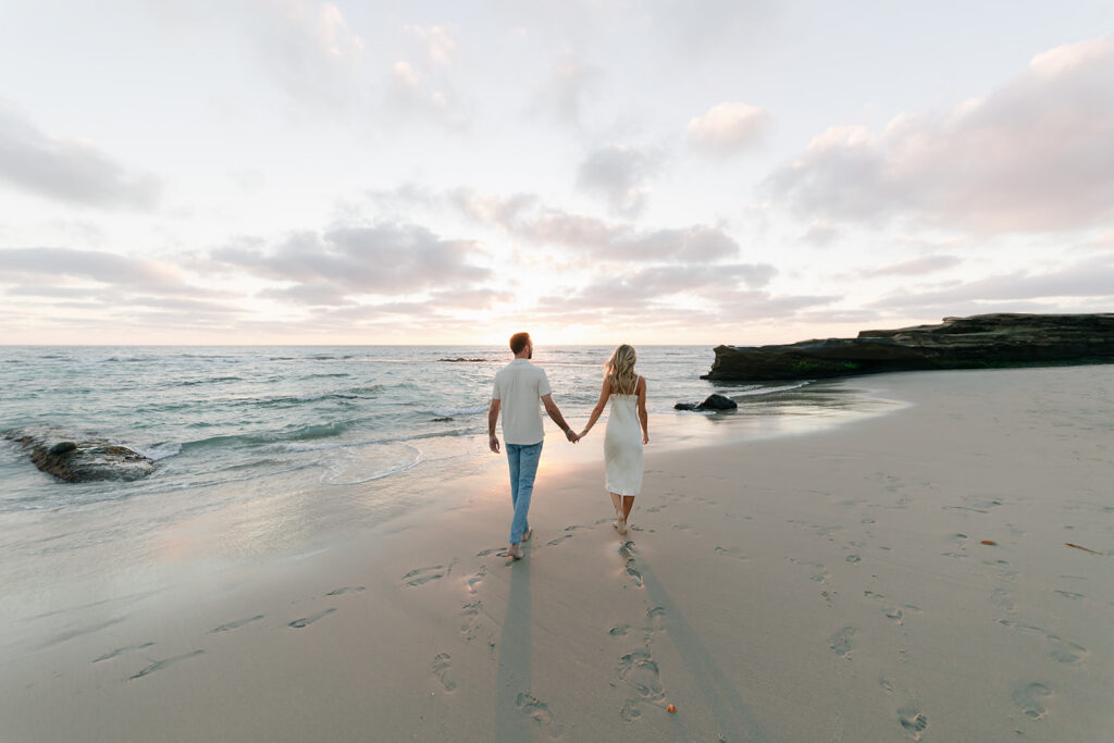 Peacful engagement portrait in WindeandSea Beach La Jolla